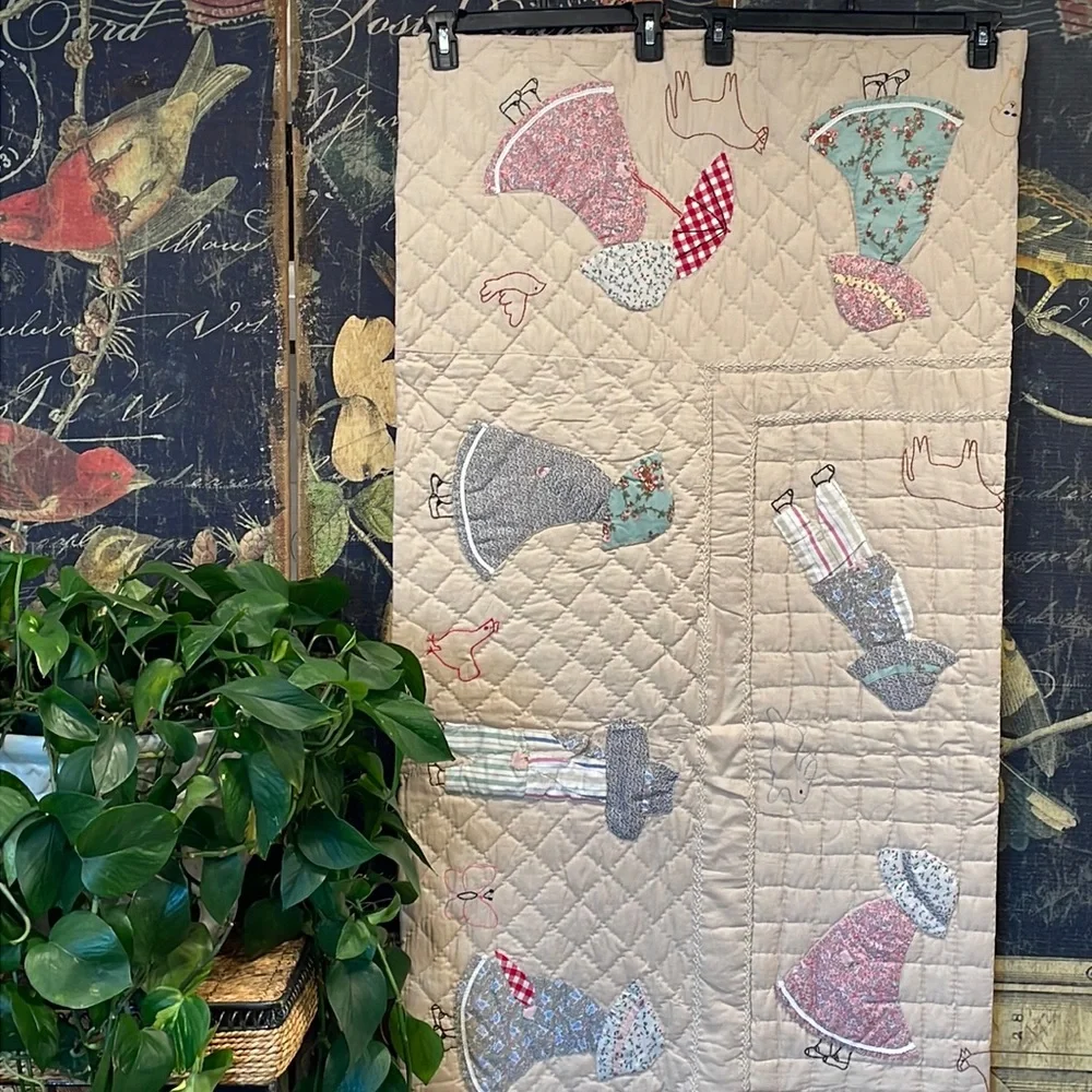 Appliqued and embroidered quilt